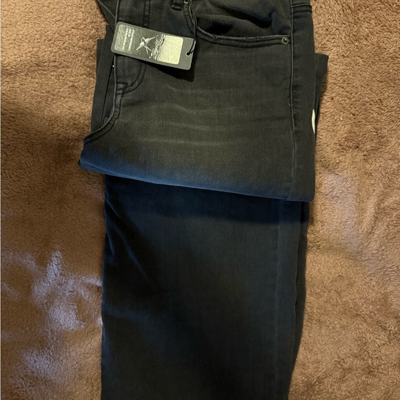 Ed Hardy Black Flare Jeans with Bold Tattoo-Inspired Design - Picture 3 of 5